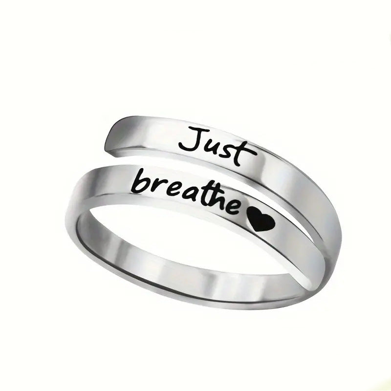 Anillo de corazón en espiral plateado